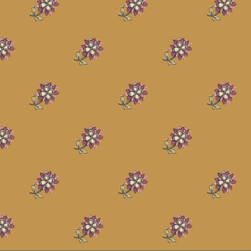 A repeating floral pattern on a warm mustard-yellow background, with small purple and white flowers and green stems. A ruler strip appears along the bottom edge for scale.