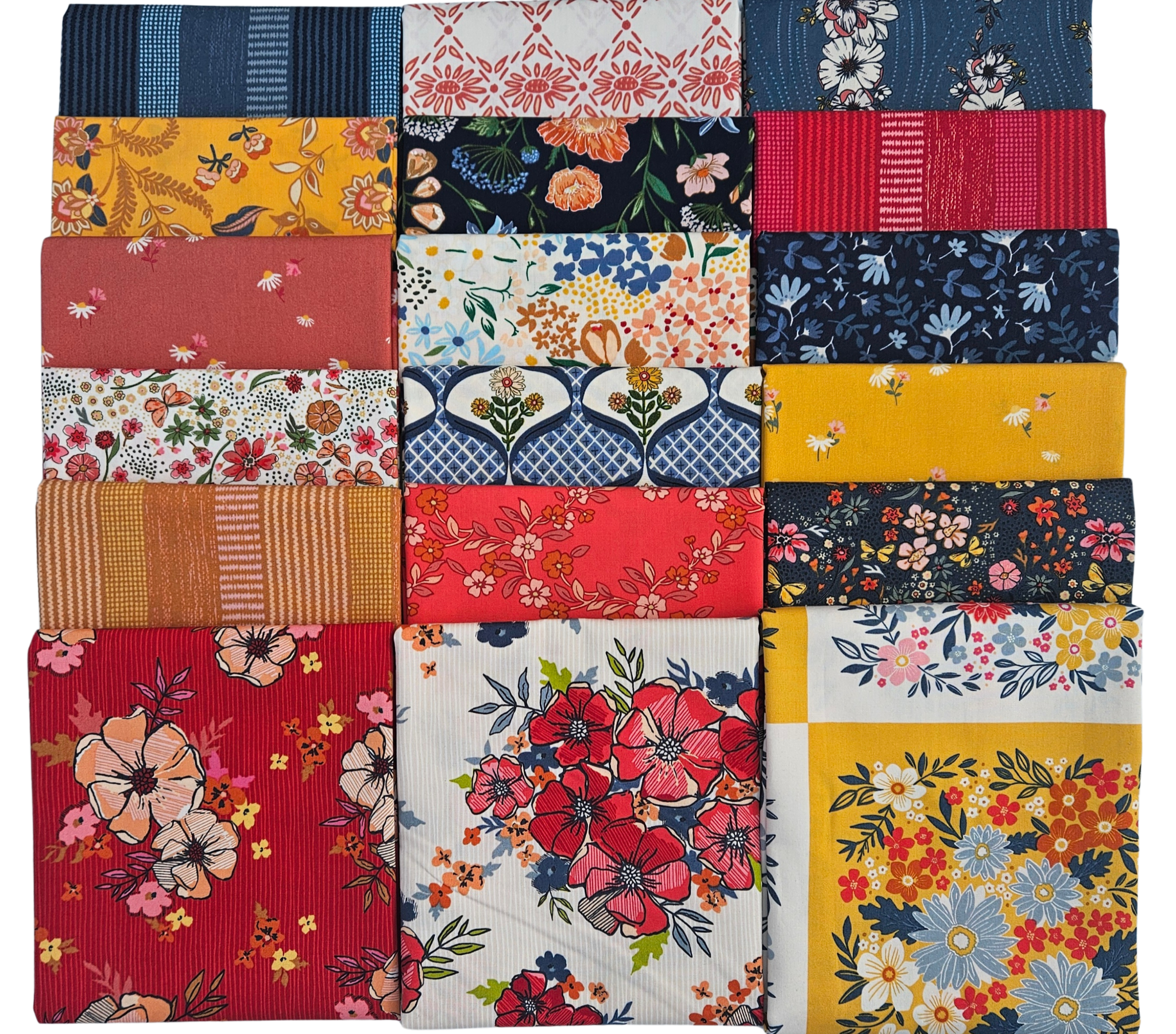 Stack of colorful fabric squares with floral patterns on a white background