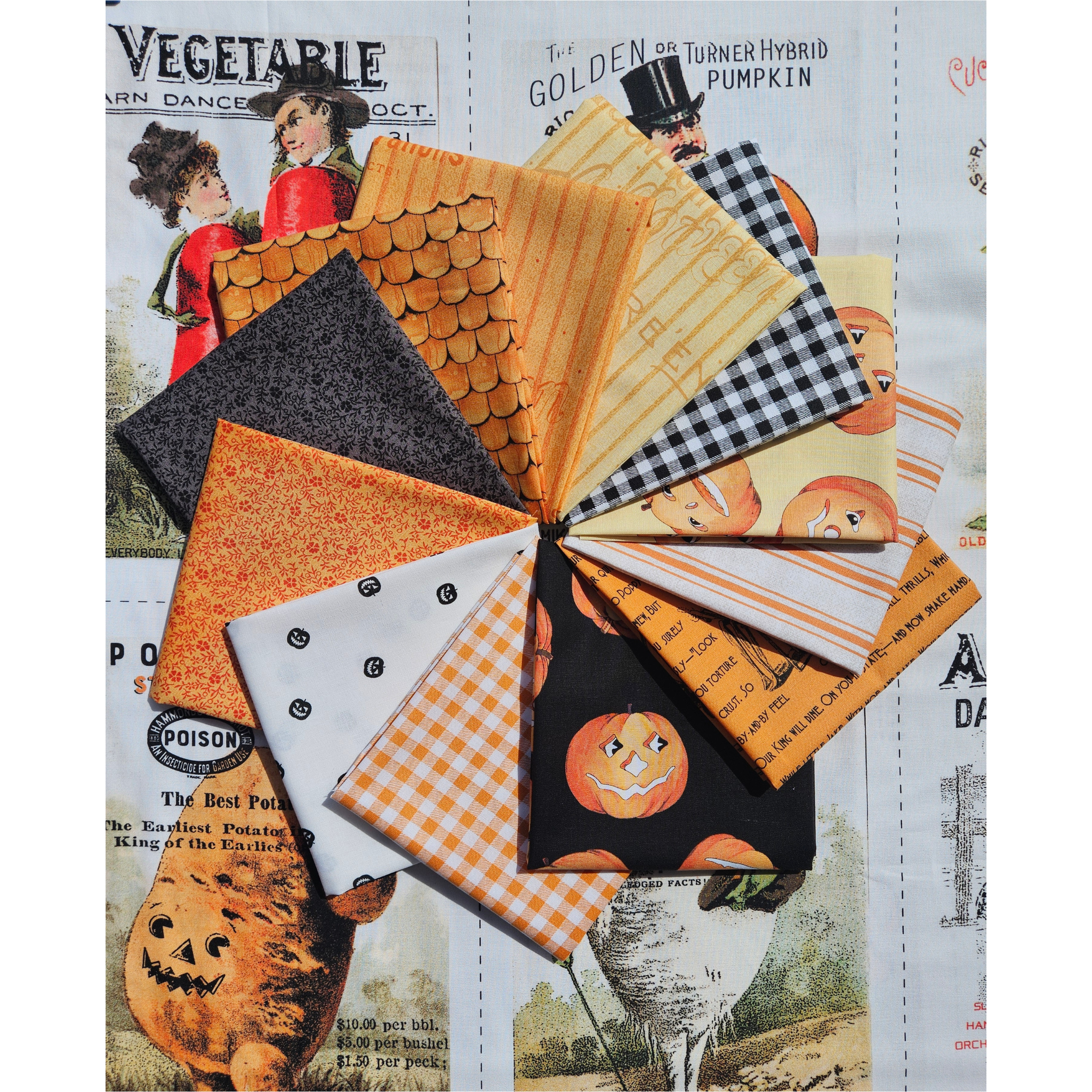 A fan arrangement of Halloween-themed fabric swatches, including orange pumpkins, black and white gingham, orange plaid, black gingham, and orange-and-white stripes, displayed over a fabric Panel in the background.