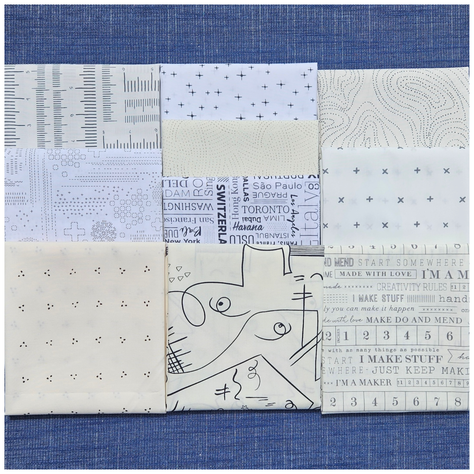 Collection of fabric swatches with various patterns on a blue background