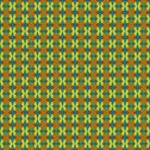 Patterned fabric with a geometric design in green, orange, and blue.