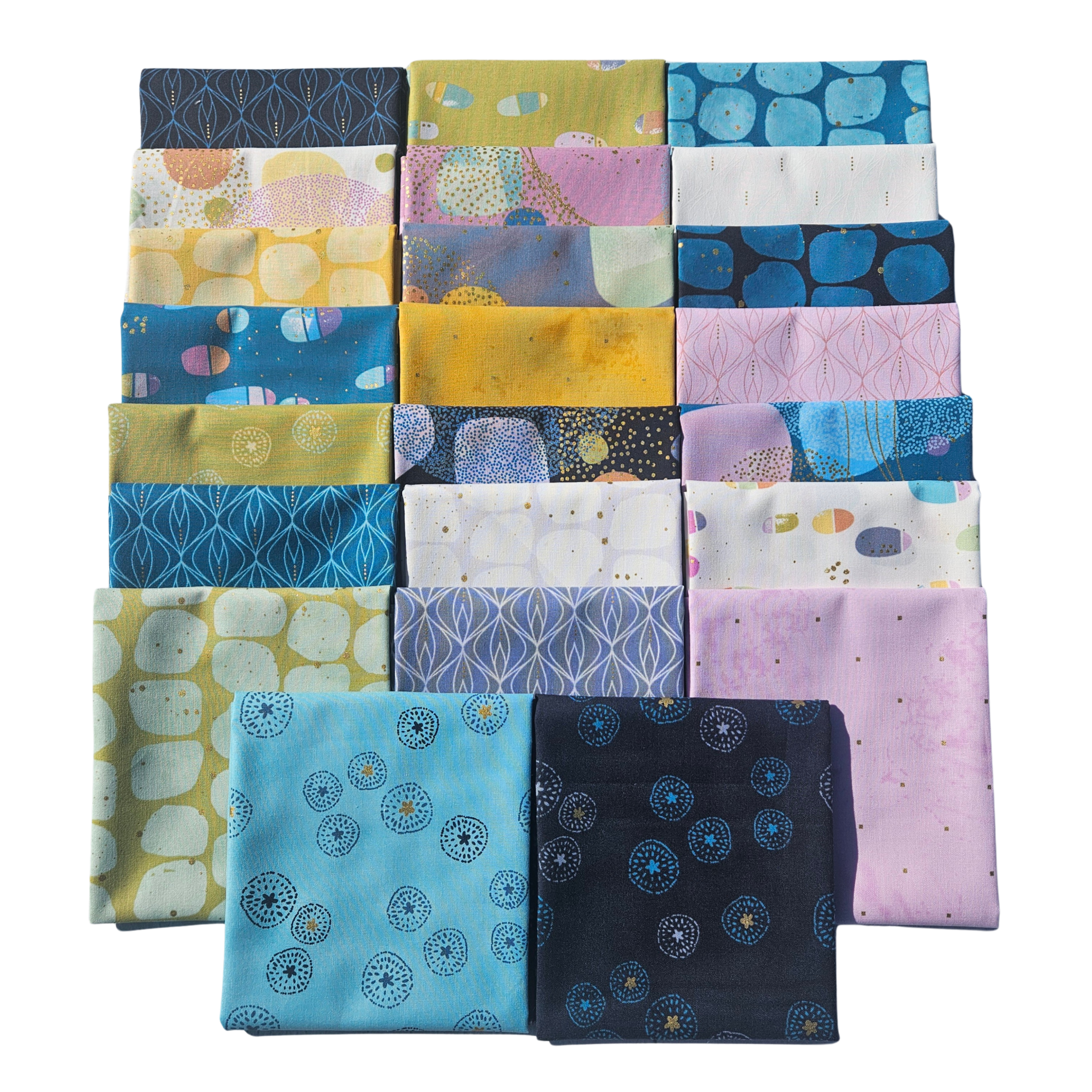 Collection of colorful fabric squares arranged in a grid pattern on a white background