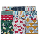 Collection of various patterned fabric swatches arranged in a grid on a white background.