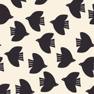 Pattern of black birds on a beige background