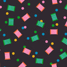 Colorful pattern of spools and polka dots on a dark background